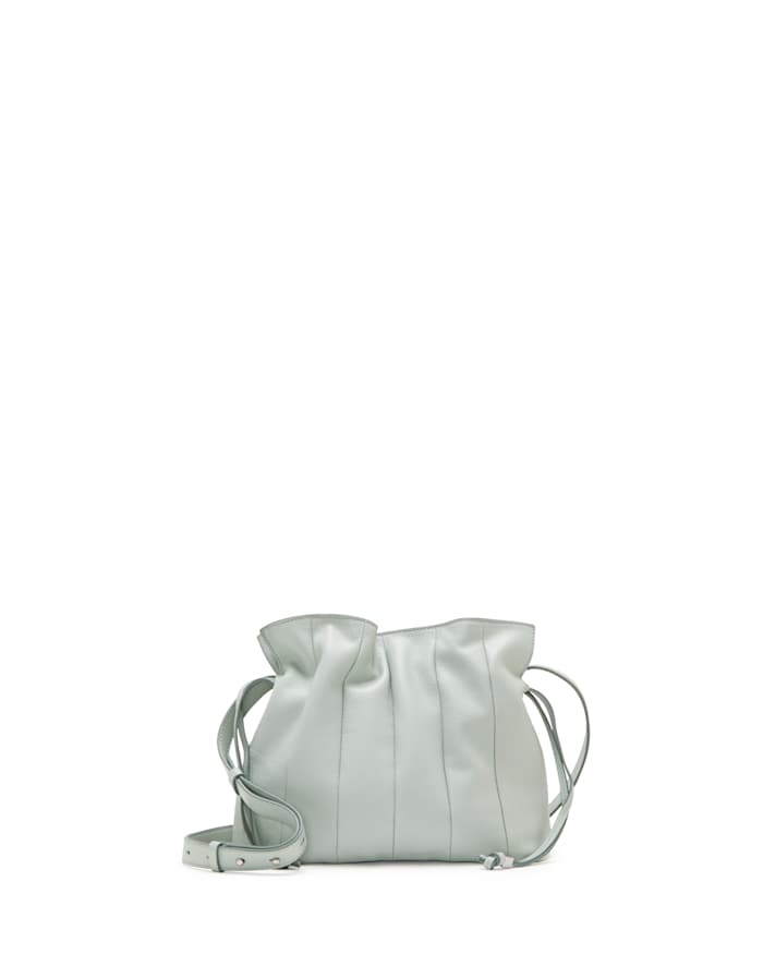 The pleats add a bit of dimension to this crossbody while the paper bag topline with drawstring pulls and debossed logo at the back add an additional flair.